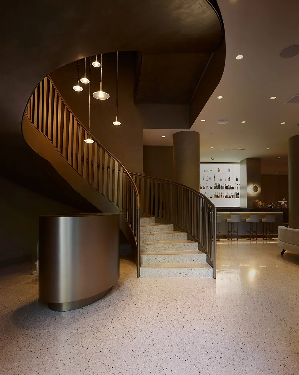 Terrazzo floor with a sculptural staircase