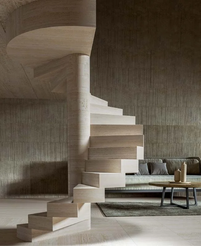 Interior with a travertine spiral staircase and lounge