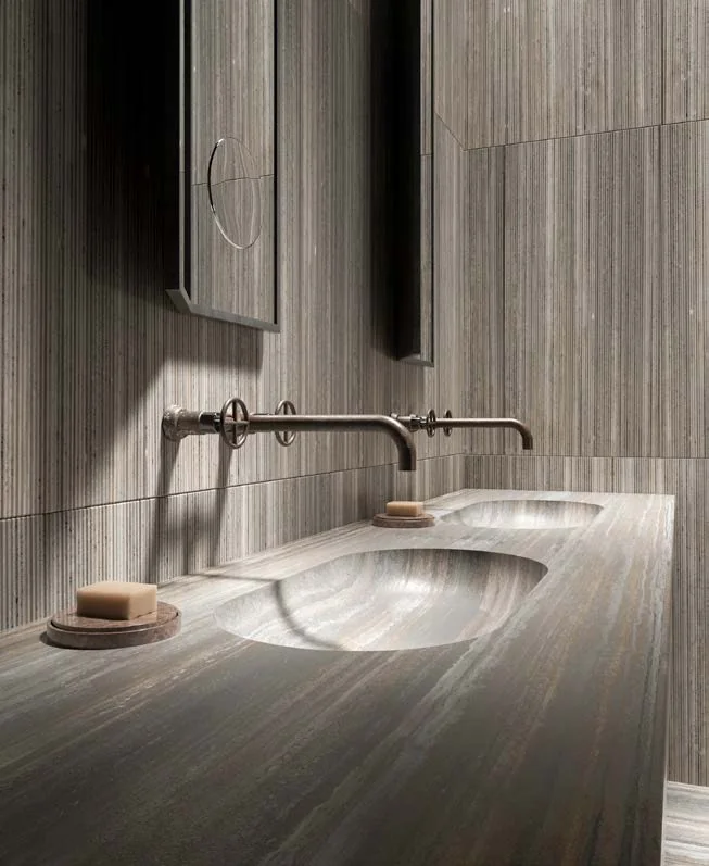 Travertine vanity with a basin