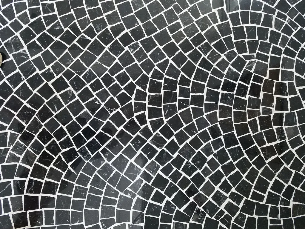 Black marble Palladiana floor detail in a fan pattern