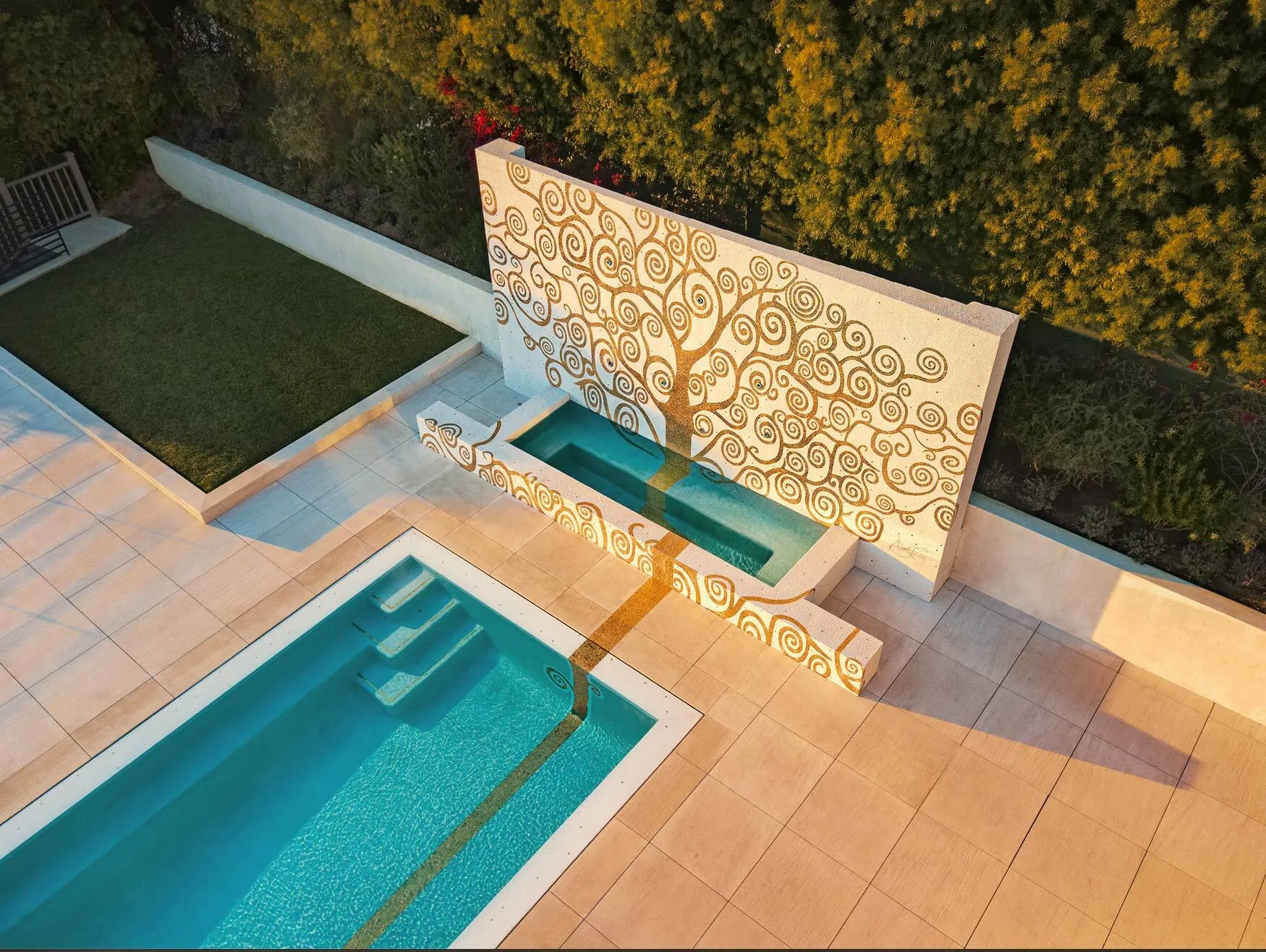 Beverly Hills pool with a gold mosaic Tree of Life feature wall