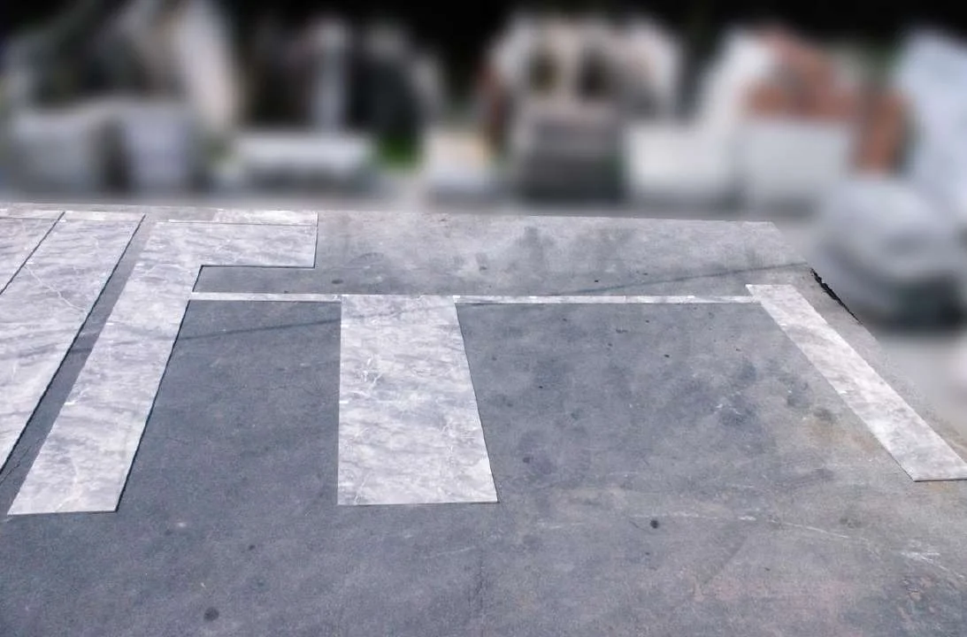 Aerial view of stone panels dry-laid on the ground for inspection