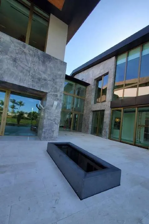 The residence seen from the water side, with the lake in the foreground