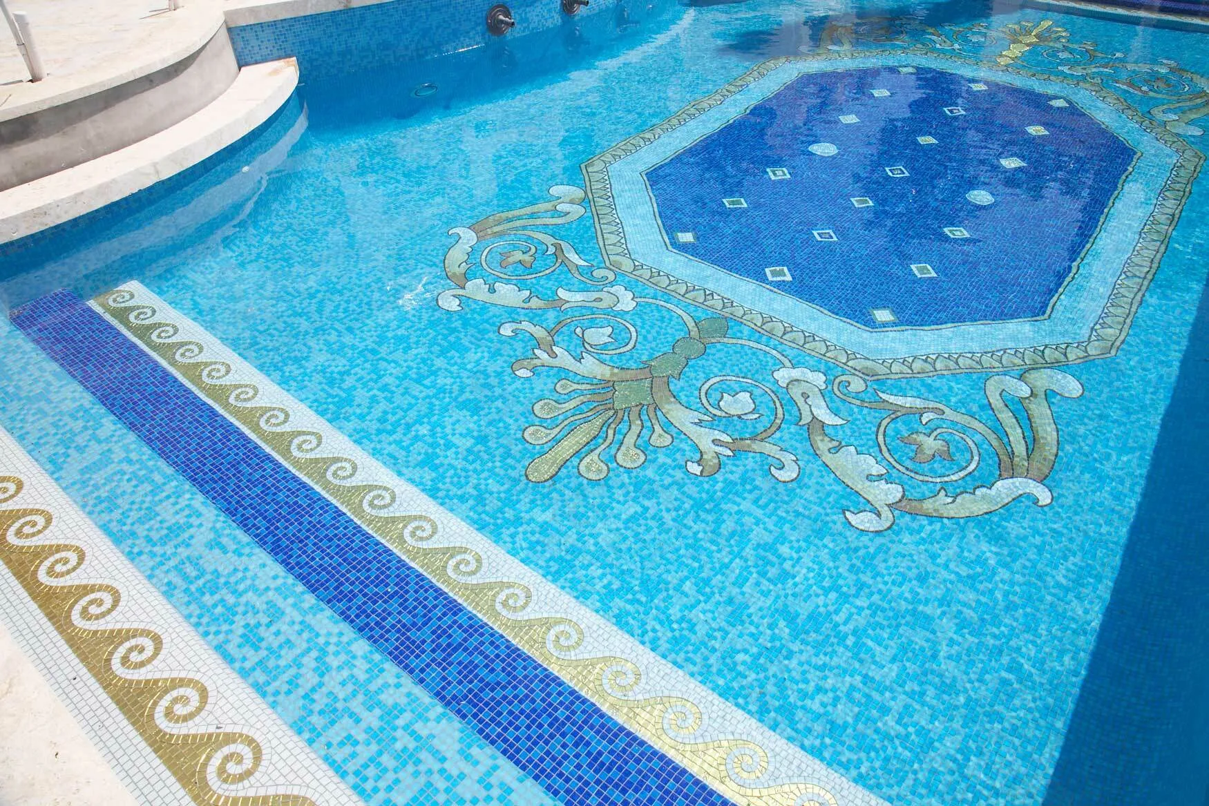 Mosaic swimming pool on Indian Creek Island seen from the deck