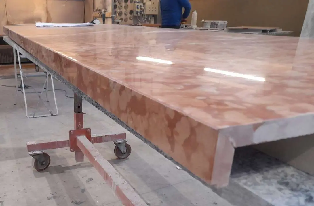 Polished Rosso Verona slab on trestles