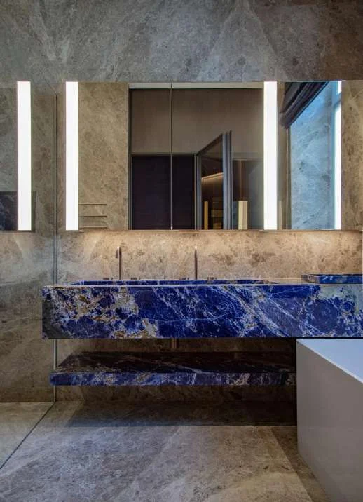 Bespoke blue stone vanity with basin