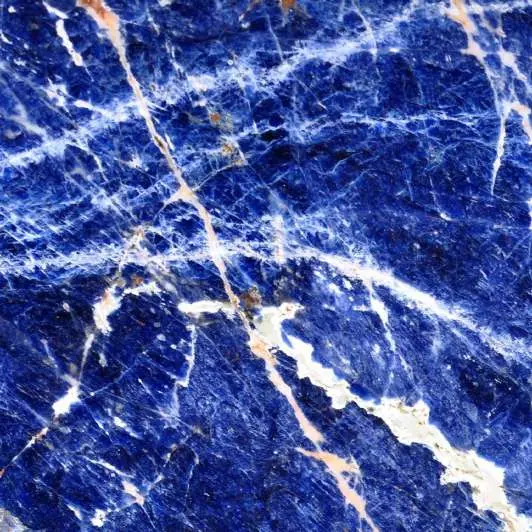 Close view of blue Lapislazuli with gold and white veins
