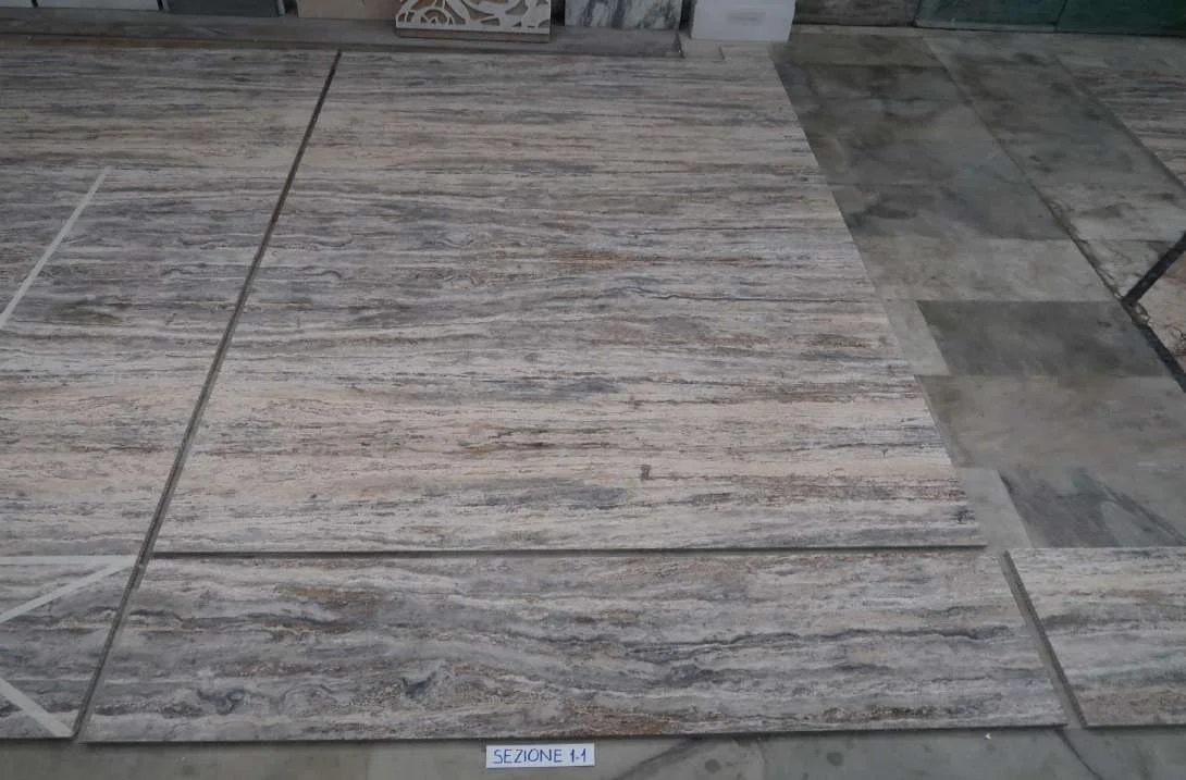 Travertine floor panels dry-laid for inspection
