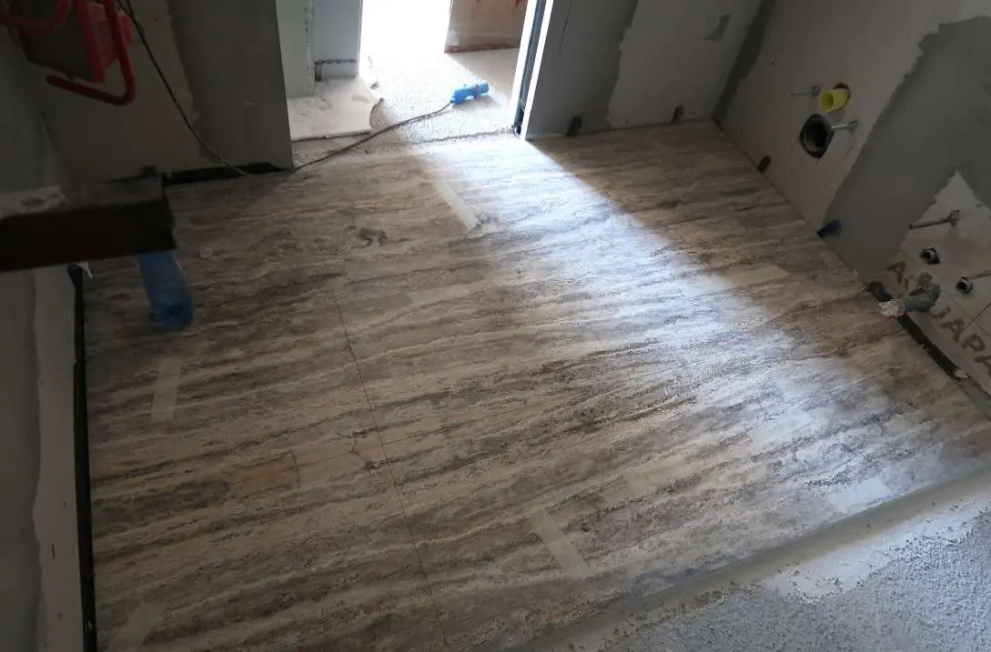 Travertine floor laid across a room