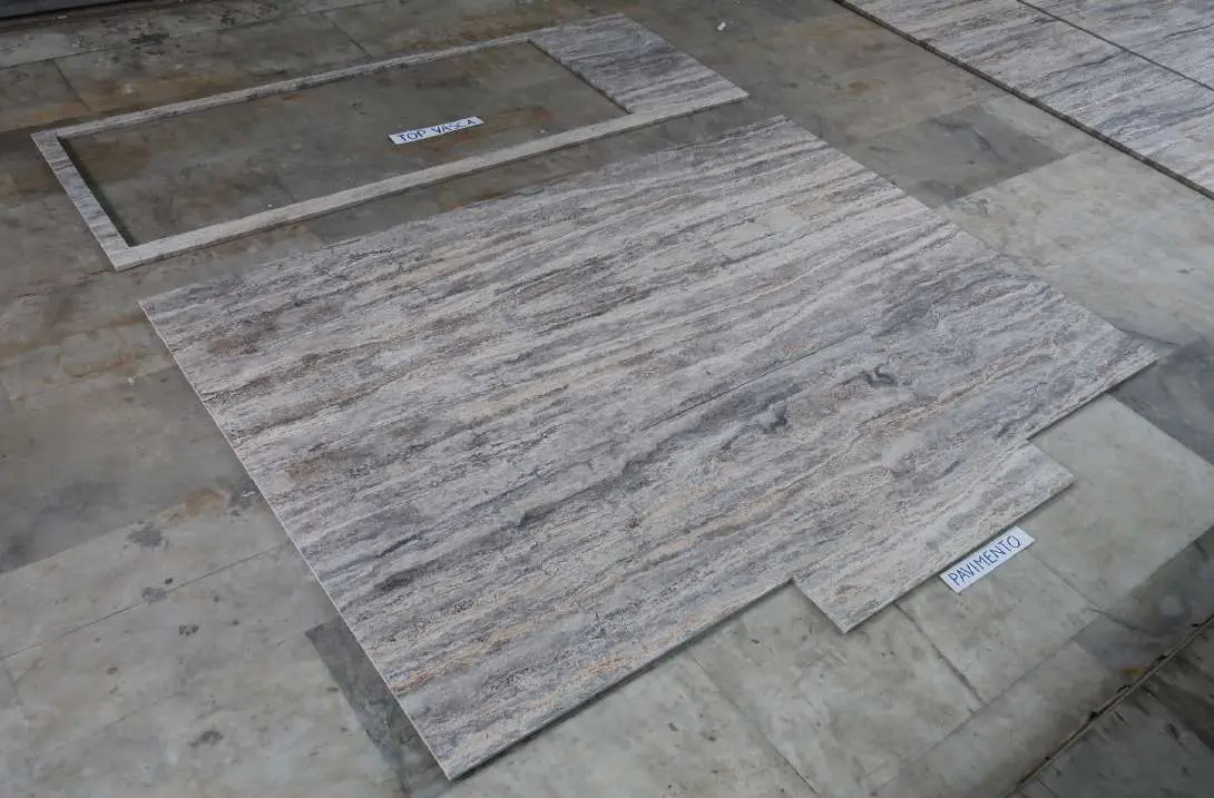 Dry-laid travertine floor with a recessed inset
