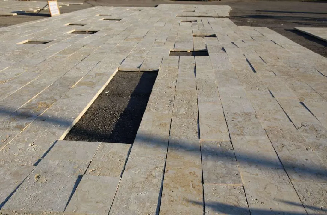 Close-up of the finished coquina panels laid out for inspection