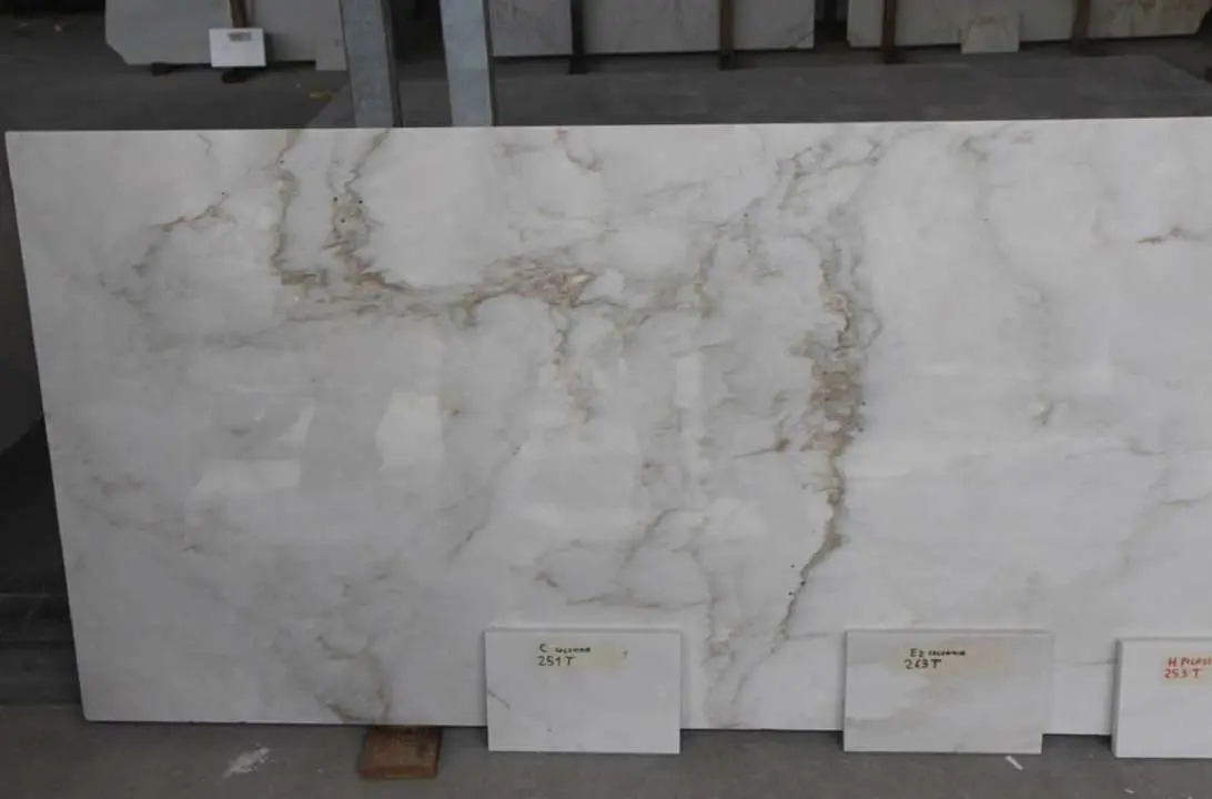 Marble slab marked with quality annotations for a specific column