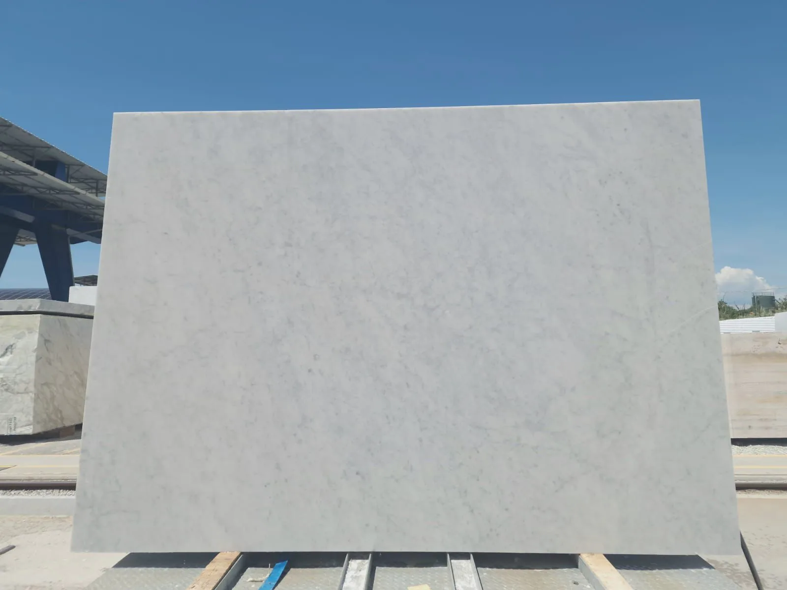 White Carrara marble slab at the quarry