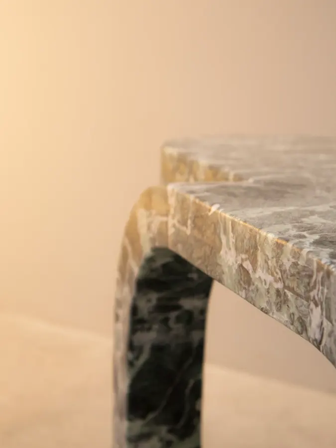 Cut and Fold marble coffee table in Verde Notte