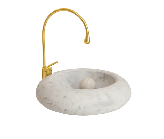 Roll Ball countertop marble washbasin, cutout on a plain background