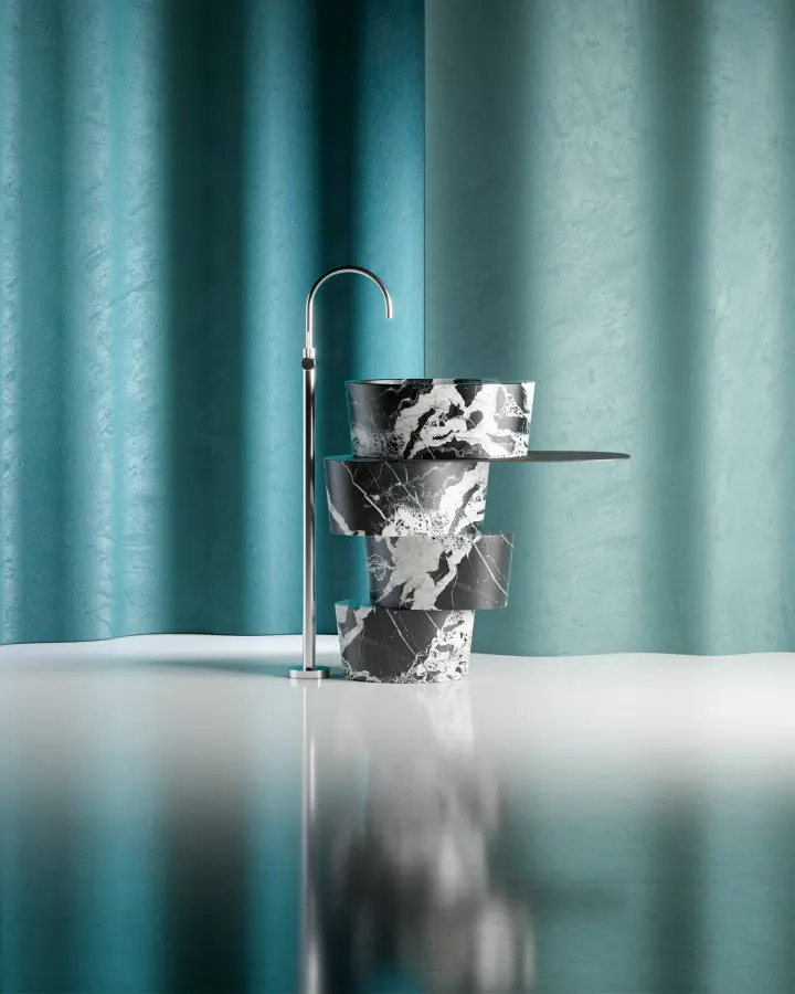 Freestanding marble washbasin against a teal curtain