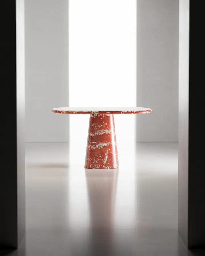 Wedge marble dining table in Rosso Francia