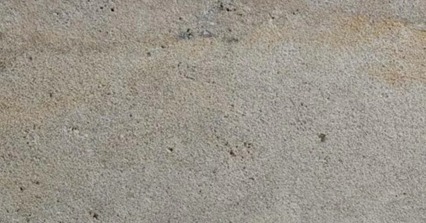 Mahogany travertine, bush-hammered